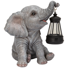 画像をギャラリービューアに読み込む, ソーラーランプを鼻で持ち上げる赤ちゃんゾウ|WooBia(ウービア)