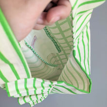 画像をギャラリービューアに読み込む, 作家オリジナル生地でつくった手持ちタイプのアシメフリルバッグ|takutomo(タクトモ)