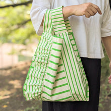 画像をギャラリービューアに読み込む, 作家オリジナル生地でつくった手持ちタイプのアシメフリルバッグ|takutomo(タクトモ)