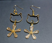 画像をギャラリービューアに読み込む, 猫耳カットと透き通るオレンジの花モチーフピアス|mimine(ミミンヌ)