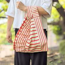 画像をギャラリービューアに読み込む, 作家オリジナル生地でつくった手持ちタイプのアシメフリルバッグ|takutomo(タクトモ)