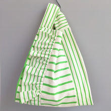 画像をギャラリービューアに読み込む, 作家オリジナル生地でつくった手持ちタイプのアシメフリルバッグ|takutomo(タクトモ)