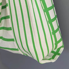 画像をギャラリービューアに読み込む, 作家オリジナル生地でつくった手持ちタイプのアシメフリルバッグ|takutomo(タクトモ)