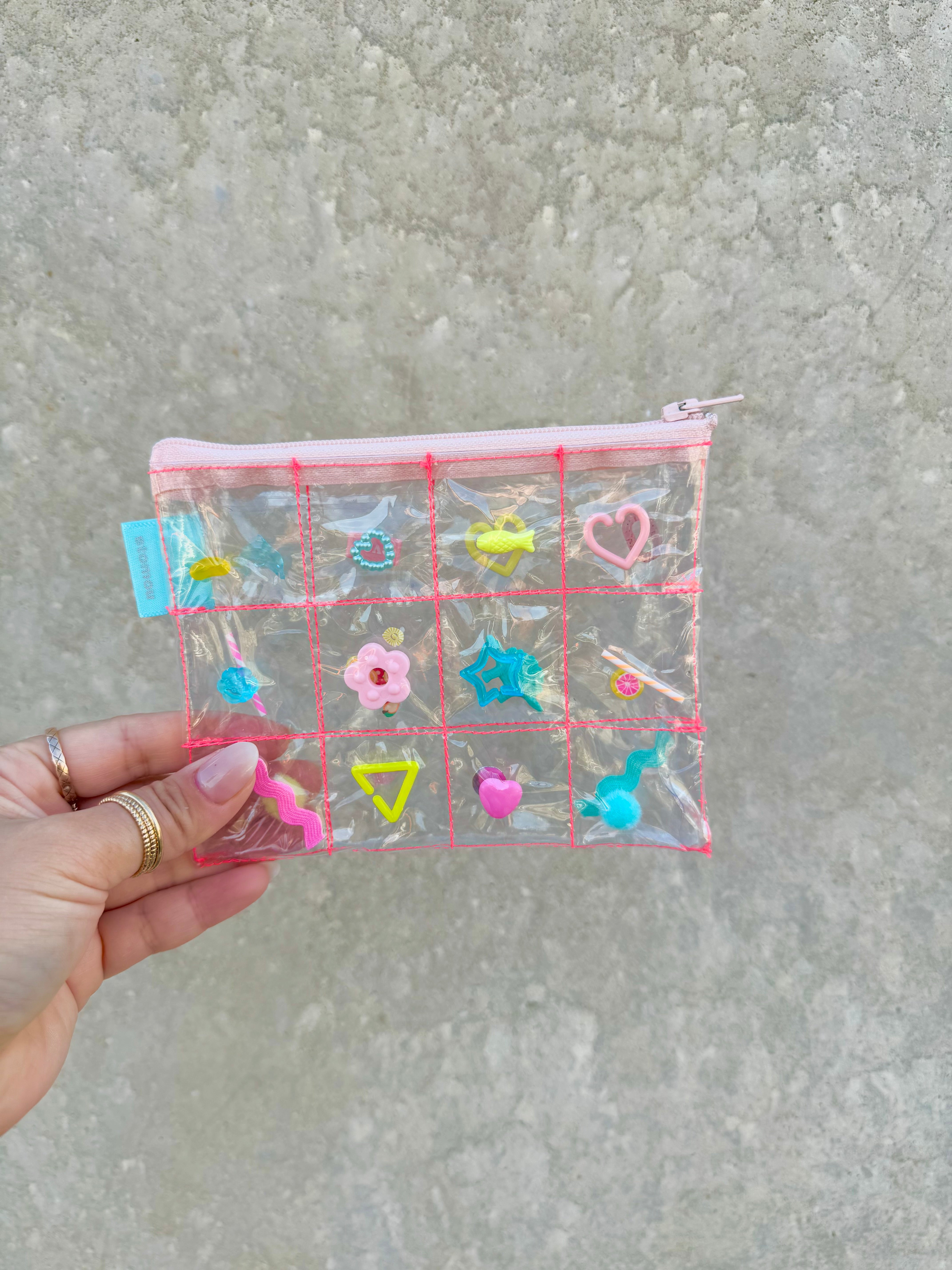 パーツ沢山ポーチ｜stomou（ストマウ）