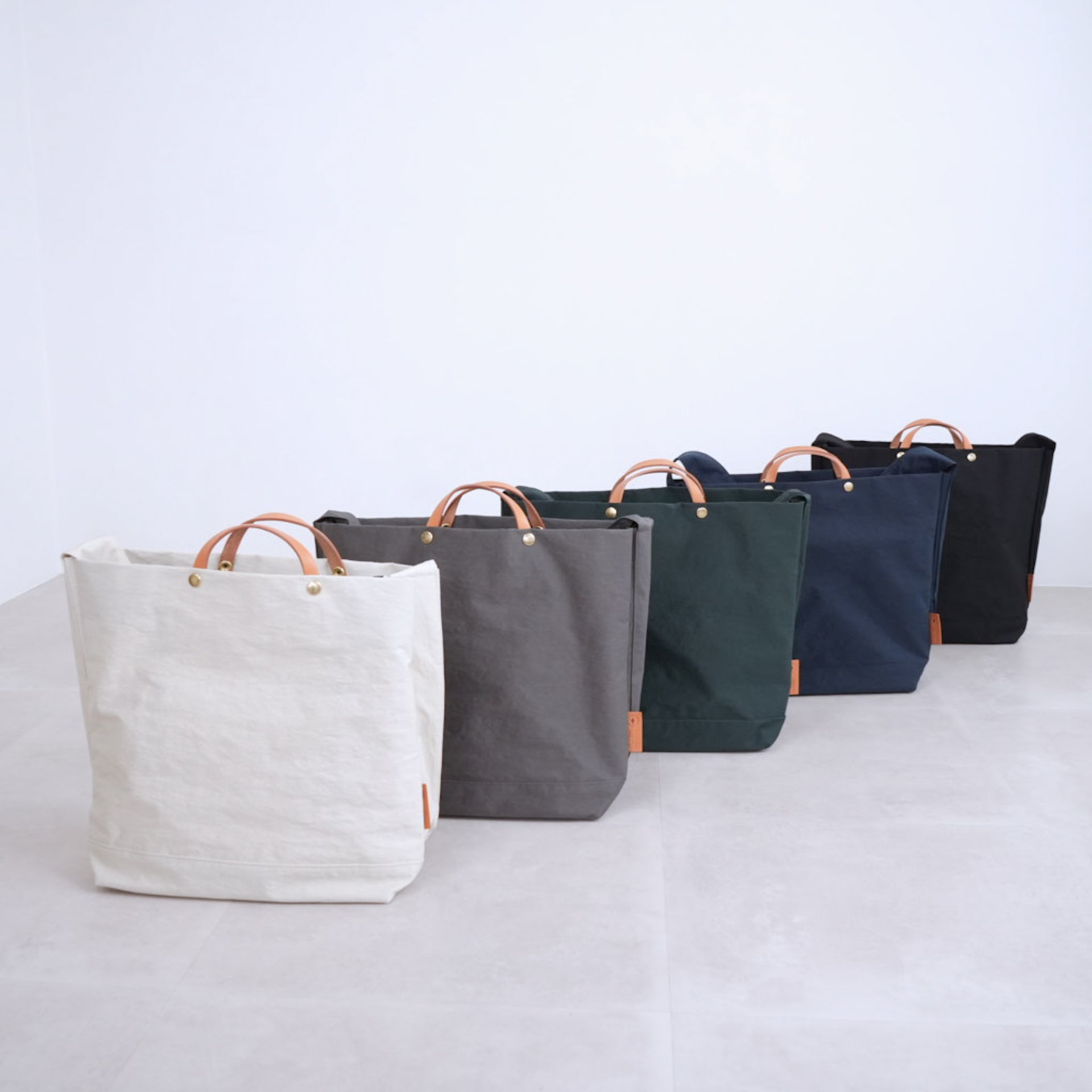 News paper tote｜TUTUMU（ツツム）