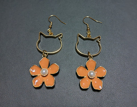 mimine 猫耳カットとオレンジの花モチーフピアス｜mimine（ミミンヌ）