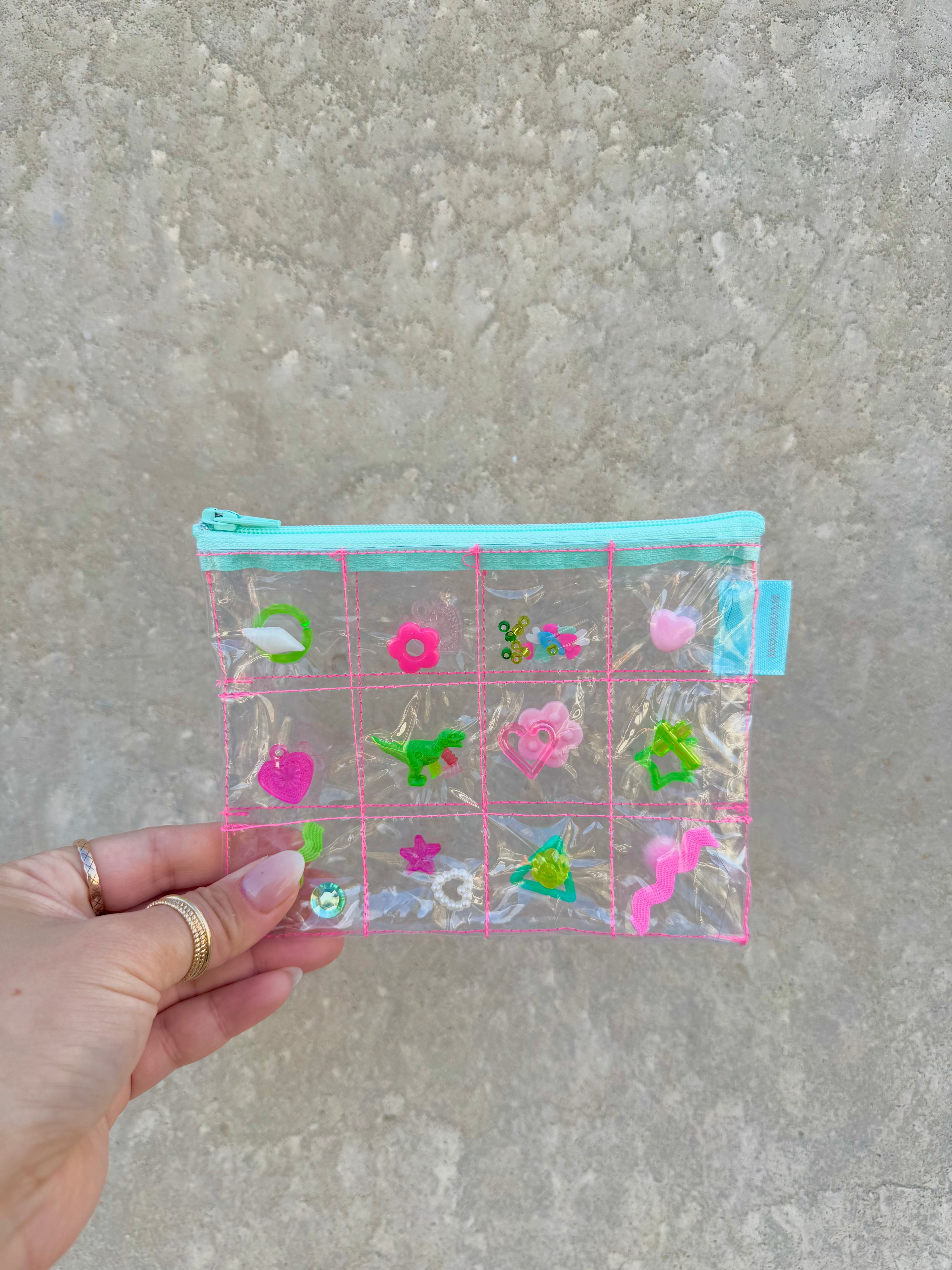 パーツ沢山ポーチ｜stomou（ストマウ）