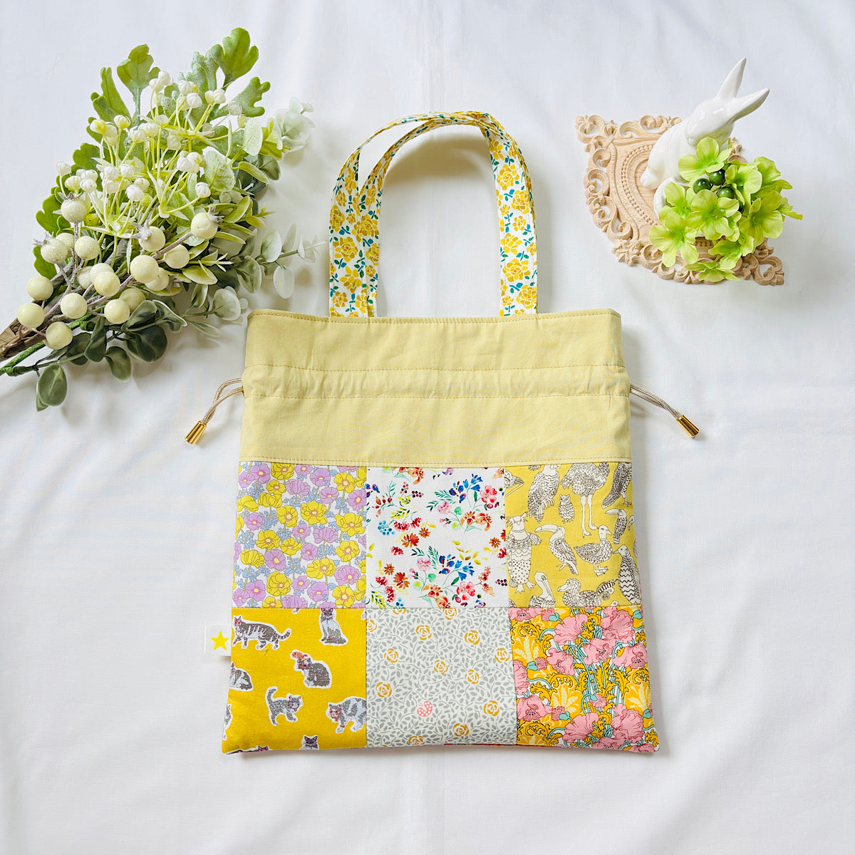 パッチワーク巾着バッグ（イエロー）｜Nikomatch（ニコマッチ）