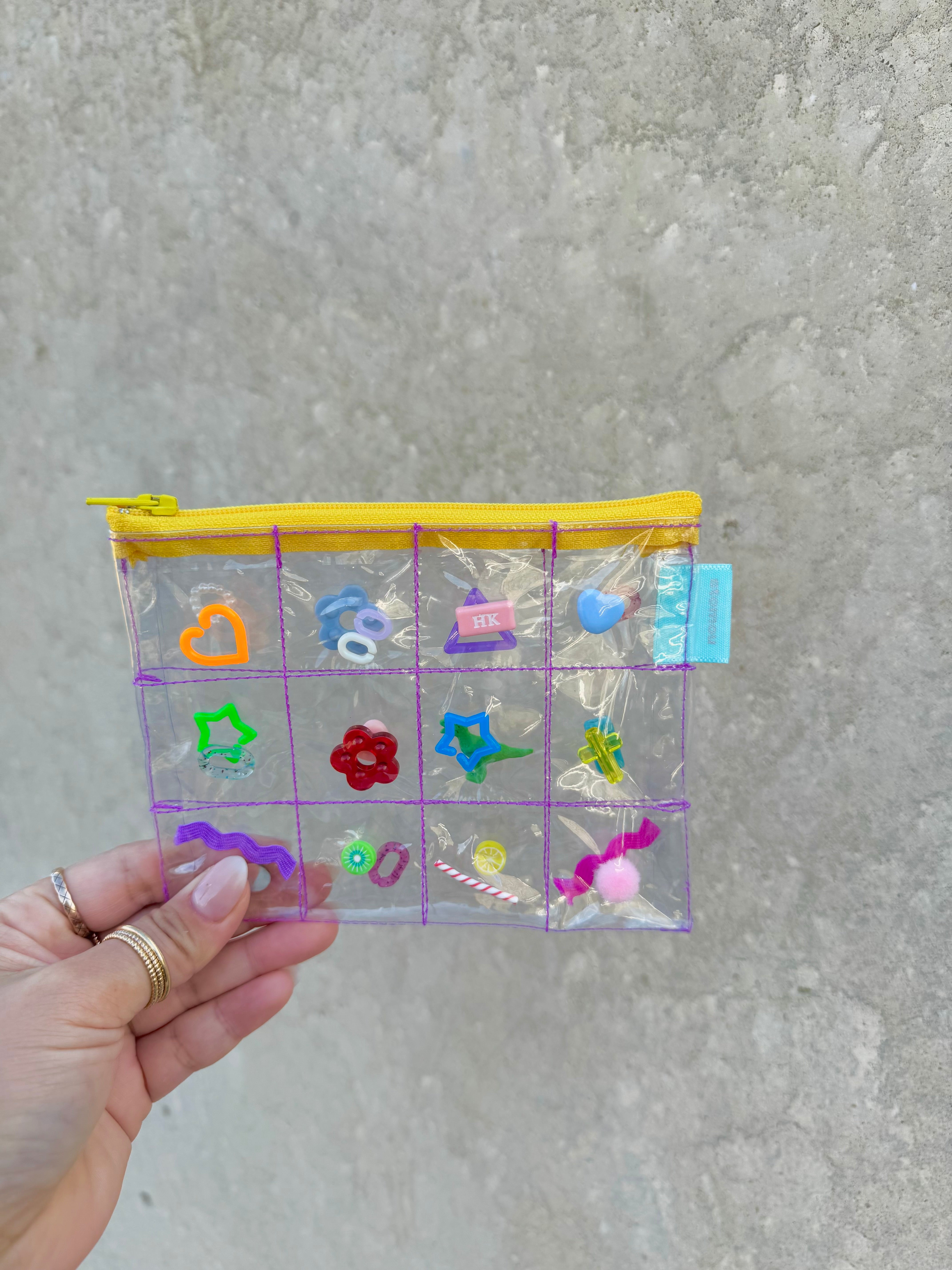 パーツ沢山ポーチ｜stomou（ストマウ）